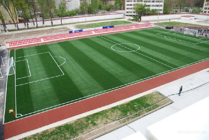 спортивный рулонный газон. искусственное футбольное поле. футбольное поле с искусственным покрытием. искусственное футбольное поле. футбольное поле.